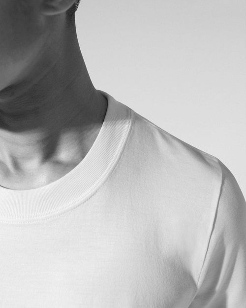 model wearing Midweight T-Shirt in White - CDLP