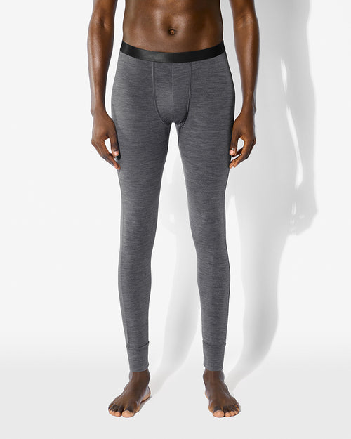 Our Merino Blend Long Johns in Grey Melange worn by a model against a white background.