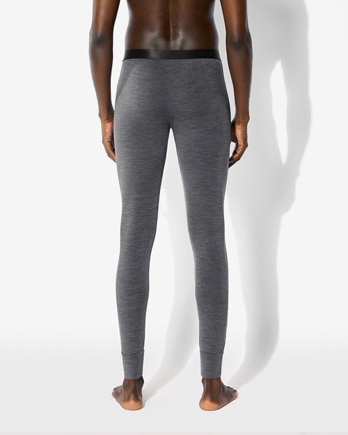 Rear view of our Grey Melange Merino Blend Long Johns on a model showing the snug fit and signature waistband.