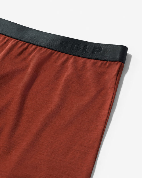 Close-up of Rust Merino Blend Long Johns showing the signature waistband and fabric texture.