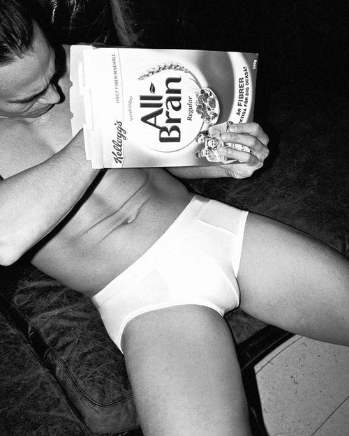 Oskar eating cornflakes while wearing Y-Brief in White
