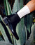 Oskar wearing Bamboo Mid-Length Socks in White