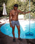 Marcus cleaning the pool wearing Moisture Wicking Boxer Brief in Sky Grey