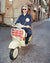 Francesco riding on a scooter wearing Home Shirt in Navy Blue