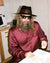 Sébastien eating breakfast wearing Home Suit in Burgundy