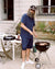 Sébastien grills hot dogs wearing Home Shorts in Navy Blue